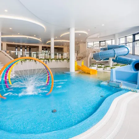 Апартаменты Polanki Aqua 3-pokojowy -premium- Family - Baseny, Wellness I Blisko Morza Garage & Pool Access Колобжег